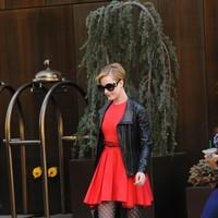 Evan Rachel Wood is seen leaving her Manhattan hotel in a chic red dress